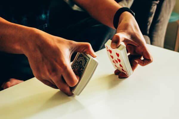 One of the way to shuffle playing cards is riffling. This is probably the most common method to provide randomness.